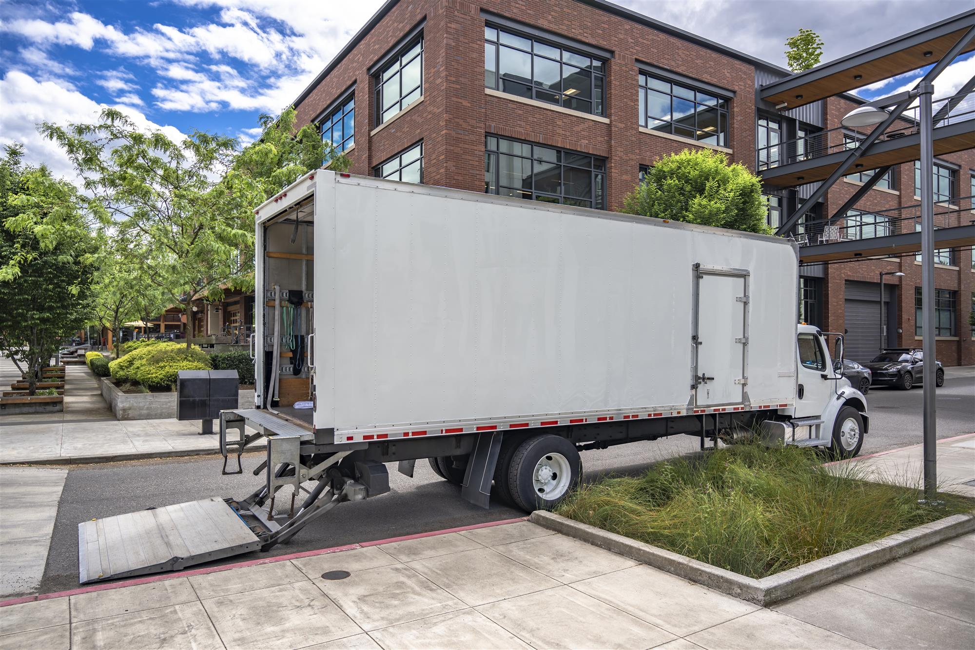 box truck parked with liftgate down